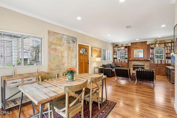 Dining room, Fireplace, Interior, Living room, Recessed Lighting, Stone Walls, Wood Texture Flooring