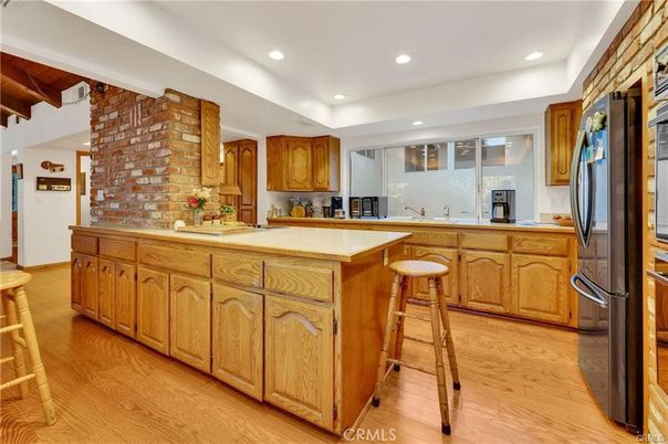 Interior, Kitchen, Recessed Lighting, Stainless Steel Appliances, Stone Walls, Wood Texture Flooring