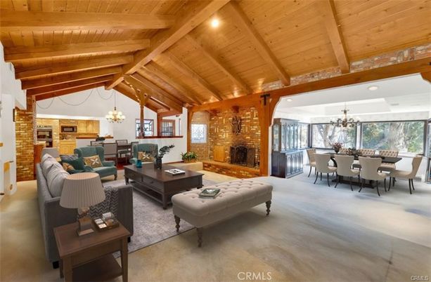 Chandelier, Dining room, Fireplace, Interior, Living room, Recessed Lighting, Stone Walls, Wooden Beams, Wooden Ceilings