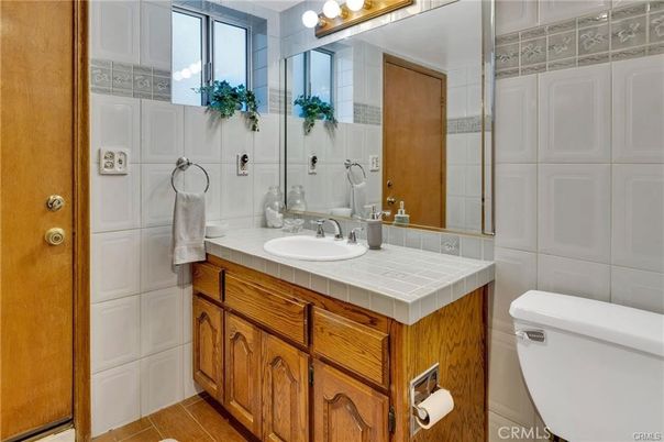 Bathroom, Dual Sink Vanities, Glass Shower, Interior, Tile Countertops