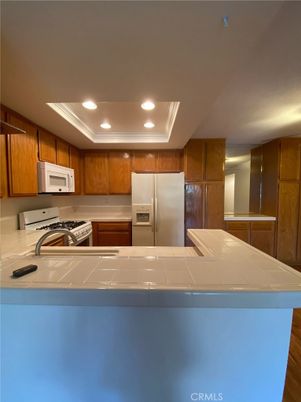 Interior, Kitchen, Recessed Lighting, Stainless Steel Appliances, Tile Countertops