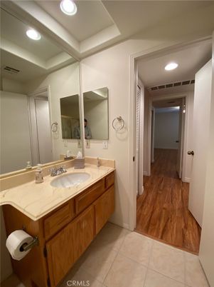 Bathroom, Dual Sink Vanities, Interior, Recessed Lighting, Wood Texture Flooring