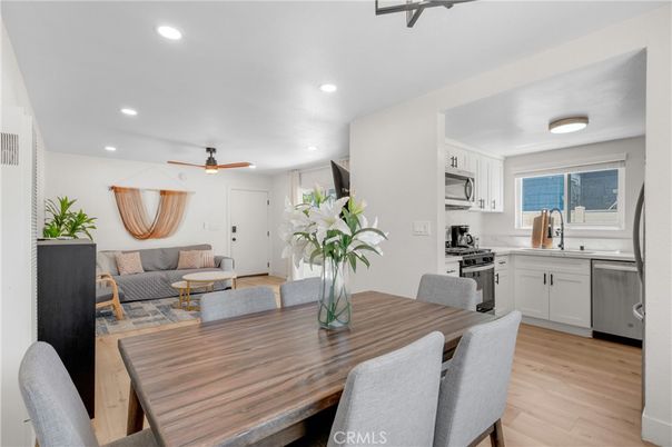 Dining room, Interior, Kitchen, Living room, Recessed Lighting, Stainless Steel Appliances, Wood Texture Flooring