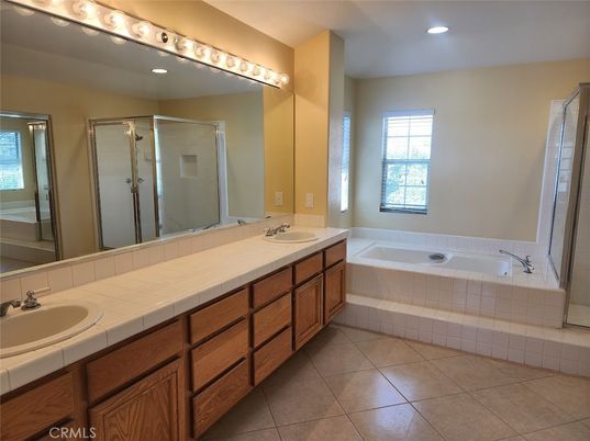Bathroom, Dual Sink Vanities, Glass Shower, Interior, Recessed Lighting, Tile Countertops