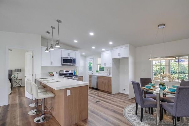 Dining room, Interior, Kitchen, Pendant Lights, Recessed Lighting, Stainless Steel Appliances, Wood Texture Flooring