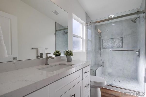 Bathroom, Glass Shower, Interior, Marble Walls, Wood Texture Flooring