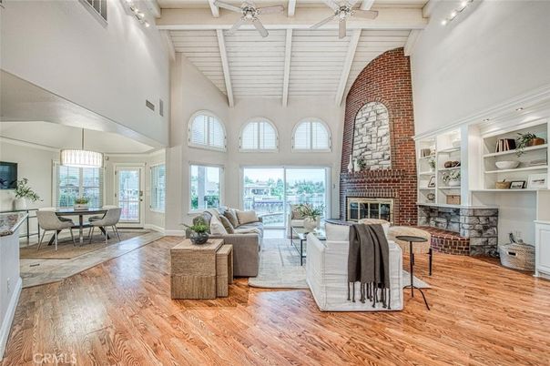 Dining room, Fireplace, Interior, Living room, Pendant Lights, Stone Walls, Wood Texture Flooring
