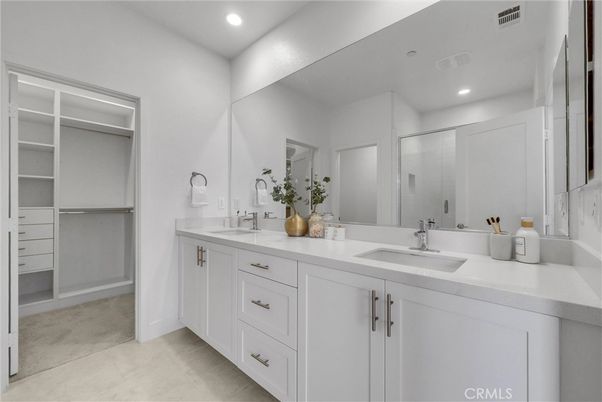 Bathroom, Dual Sink Vanities, Interior, Recessed Lighting, Walk-in Closets