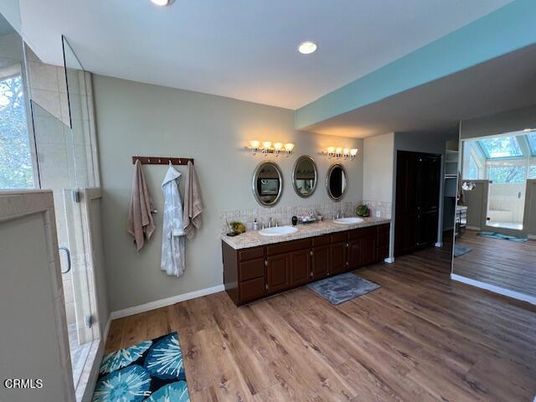 Bathroom, Dual Sink Vanities, Interior, Recessed Lighting, Wood Texture Flooring