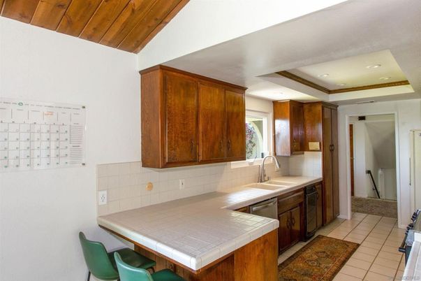 Interior, Kitchen, Recessed Lighting, Tile Countertops, Wooden Ceilings