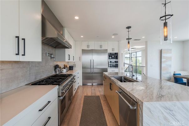 Interior, Kitchen, Pendant Lights, Recessed Lighting, Stainless Steel Appliances, Wood Texture Flooring