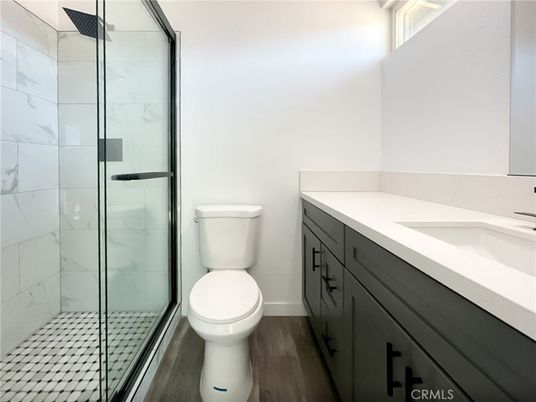 Bathroom, Glass Shower, Interior, Marble Walls, Wood Texture Flooring
