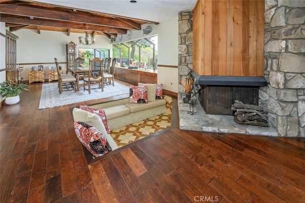 Dining room, Fireplace, Interior, Living room, Stone Walls, Wooden Beams, Wood Texture Flooring