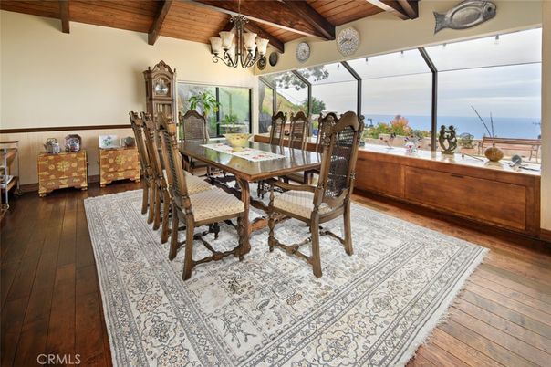 Chandelier, Dining room, Interior, Sun Room, Water, Wooden Beams, Wooden Ceilings, Wood Texture Flooring