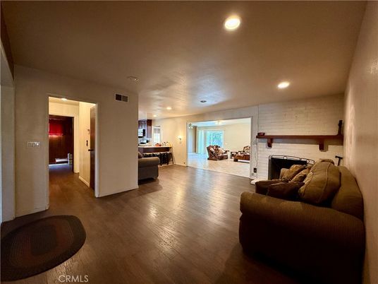 Fireplace, Interior, Kitchen, Pendant Lights, Recessed Lighting, Stone Walls, Wood Texture Flooring