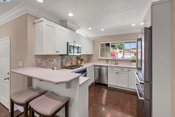 Interior, Kitchen, Recessed Lighting, Stainless Steel Appliances, Wood Texture Flooring
