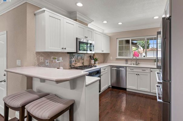 Interior, Kitchen, Recessed Lighting, Stainless Steel Appliances, Wood Texture Flooring