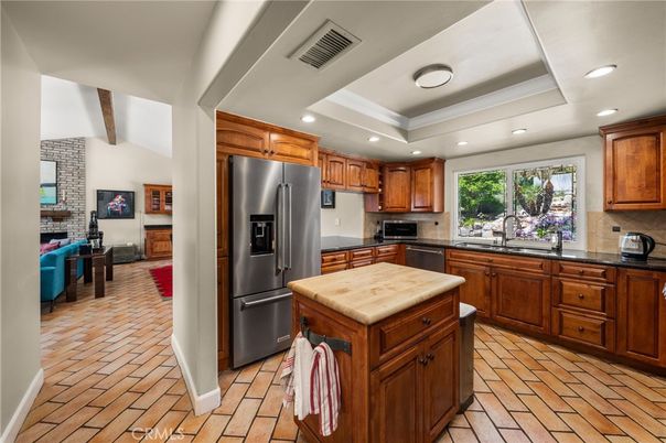Fireplace, Interior, Kitchen, Recessed Lighting, Stainless Steel Appliances, Stone Walls
