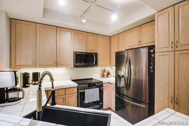 Interior, Kitchen, Recessed Lighting, Tile Countertops