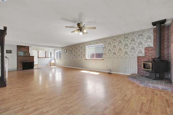 Empty room, Fireplace, Interior, Stone Walls, Wood Texture Flooring