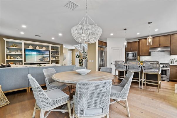 Dining room, Interior, Kitchen, Pendant Lights, Recessed Lighting, Stainless Steel Appliances, Wood Texture Flooring