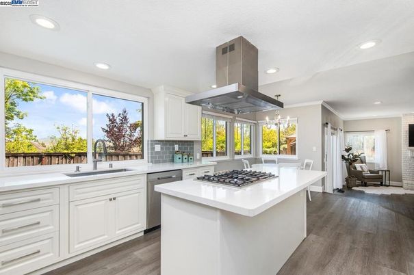 Dining room, Interior, Kitchen, Recessed Lighting, Stainless Steel Appliances, Wood Texture Flooring