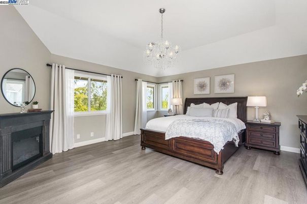 Bedroom, Chandelier, Fireplace, Interior, Wood Texture Flooring