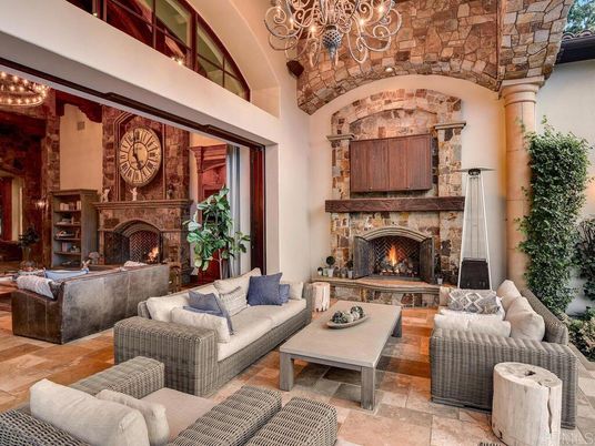 Chandelier, Fireplace, Interior, Living room, Stone Walls