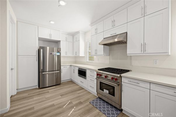 Interior, Kitchen, Recessed Lighting, Stainless Steel Appliances, Wood Texture Flooring