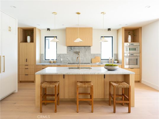 Interior, Kitchen, Marble Walls, Pendant Lights, Recessed Lighting, Stainless Steel Appliances, Wood Texture Flooring