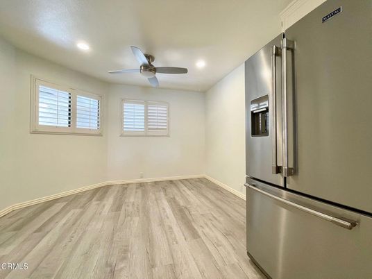 Empty room, Interior, Recessed Lighting, Stainless Steel Appliances, Wood Texture Flooring