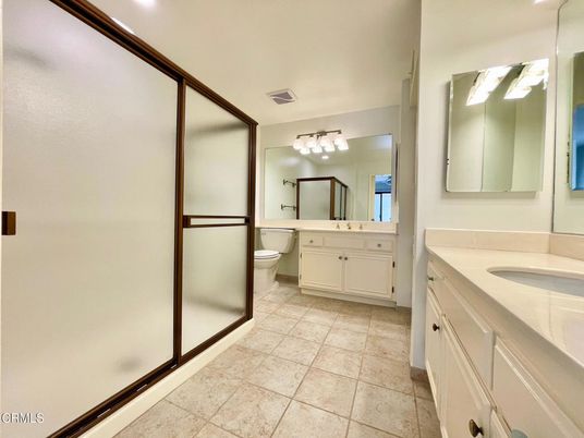 Bathroom, Dual Sink Vanities, Glass Shower, Interior, Recessed Lighting, Tile Countertops