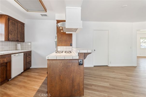 Interior, Kitchen, Tile Countertops, Wood Texture Flooring