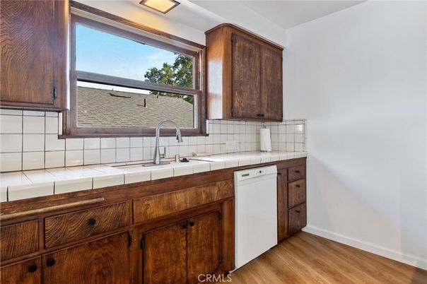 Interior, Kitchen, Tile Countertops, Wood Texture Flooring