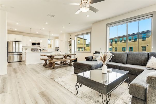 Dining room, Interior, Kitchen, Living room, Pendant Lights, Recessed Lighting, Stainless Steel Appliances, Wood Texture Flooring