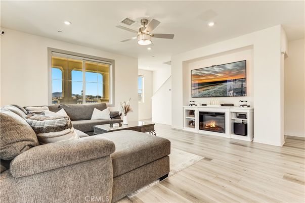 Fireplace, Interior, Living room, Recessed Lighting, Wood Texture Flooring