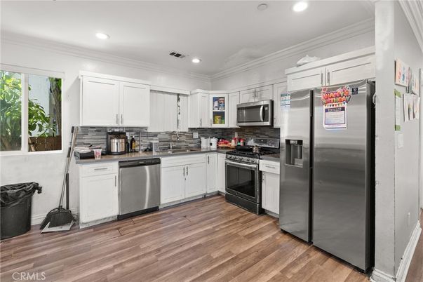 Interior, Kitchen, Recessed Lighting, Stainless Steel Appliances, Wood Texture Flooring