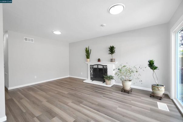 Empty room, Fireplace, Interior, Recessed Lighting, Wood Texture Flooring