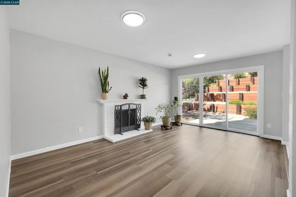 Empty room, Fireplace, Interior, Recessed Lighting, Wood Texture Flooring