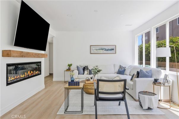 Fireplace, Interior, Living room, Recessed Lighting, Wood Texture Flooring
