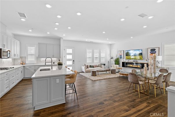 Dining room, Fireplace, Interior, Kitchen, Living room, Recessed Lighting, Wood Texture Flooring