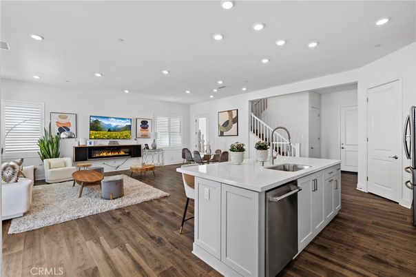 Dining room, Fireplace, Interior, Kitchen, Living room, Recessed Lighting, Wood Texture Flooring