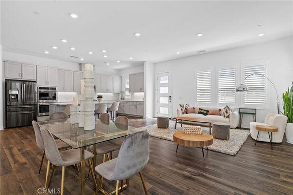 Dining room, Interior, Kitchen, Living room, Recessed Lighting, Stainless Steel Appliances, Wood Texture Flooring