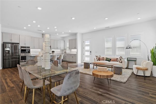 Dining room, Interior, Kitchen, Living room, Recessed Lighting, Stainless Steel Appliances, Wood Texture Flooring