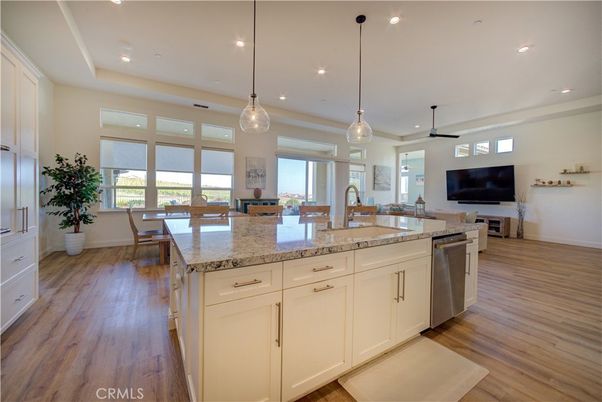 Dining room, Interior, Kitchen, Pendant Lights, Recessed Lighting, Stainless Steel Appliances, Wood Texture Flooring