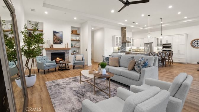 Fireplace, Interior, Kitchen, Living room, Pendant Lights, Recessed Lighting, Stainless Steel Appliances, Wood Texture Flooring