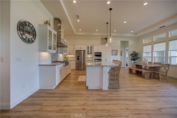 Dining room, Interior, Kitchen, Pendant Lights, Recessed Lighting, Stainless Steel Appliances, Wood Texture Flooring