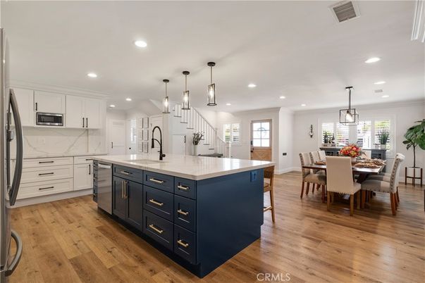 Dining room, Interior, Kitchen, Pendant Lights, Recessed Lighting, Stainless Steel Appliances, Wood Texture Flooring