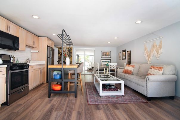 Dining room, Interior, Kitchen, Living room, Recessed Lighting, Stainless Steel Appliances, Wood Texture Flooring