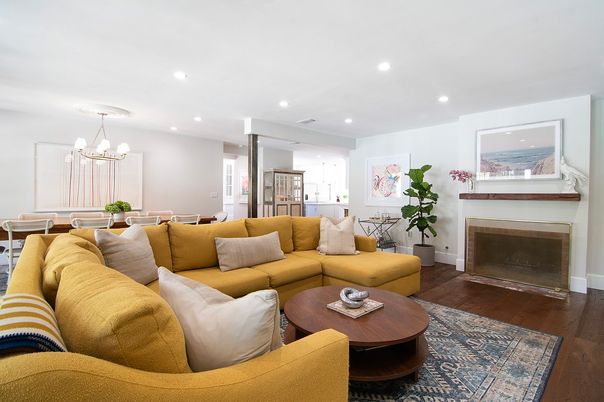 Chandelier, Dining room, Fireplace, Interior, Living room, Pendant Lights, Recessed Lighting, Wood Texture Flooring